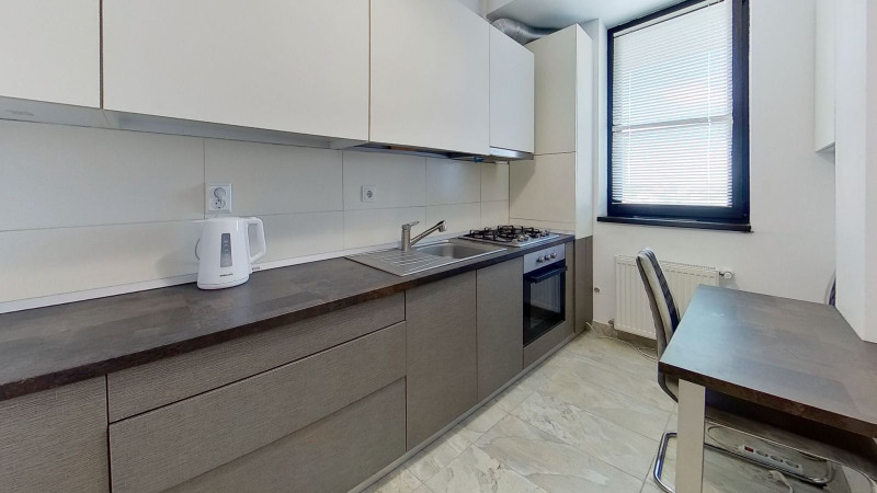 VANZAR APARTAMENT 2 CAMERE SI GARAJ SUBTERAN 